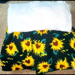 This is a summer set with shorts and a white tank top!